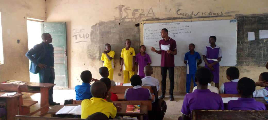 MOMF staff in classroom with students