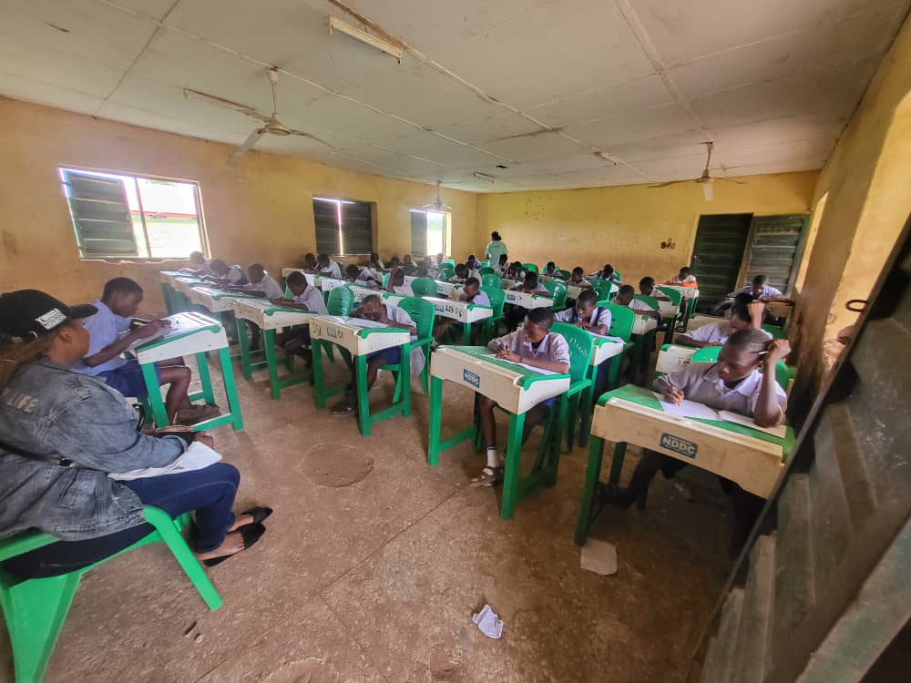 Students of Okpe Mixed Secondary School Abavo during the conduct of 2024 scholarship exam